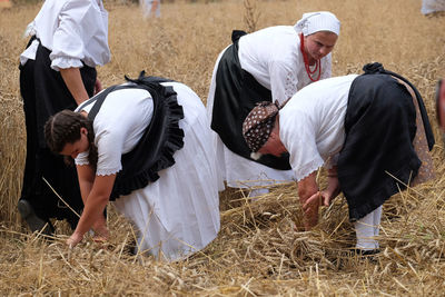 People working on field