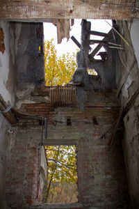 Low angle view of old abandoned building