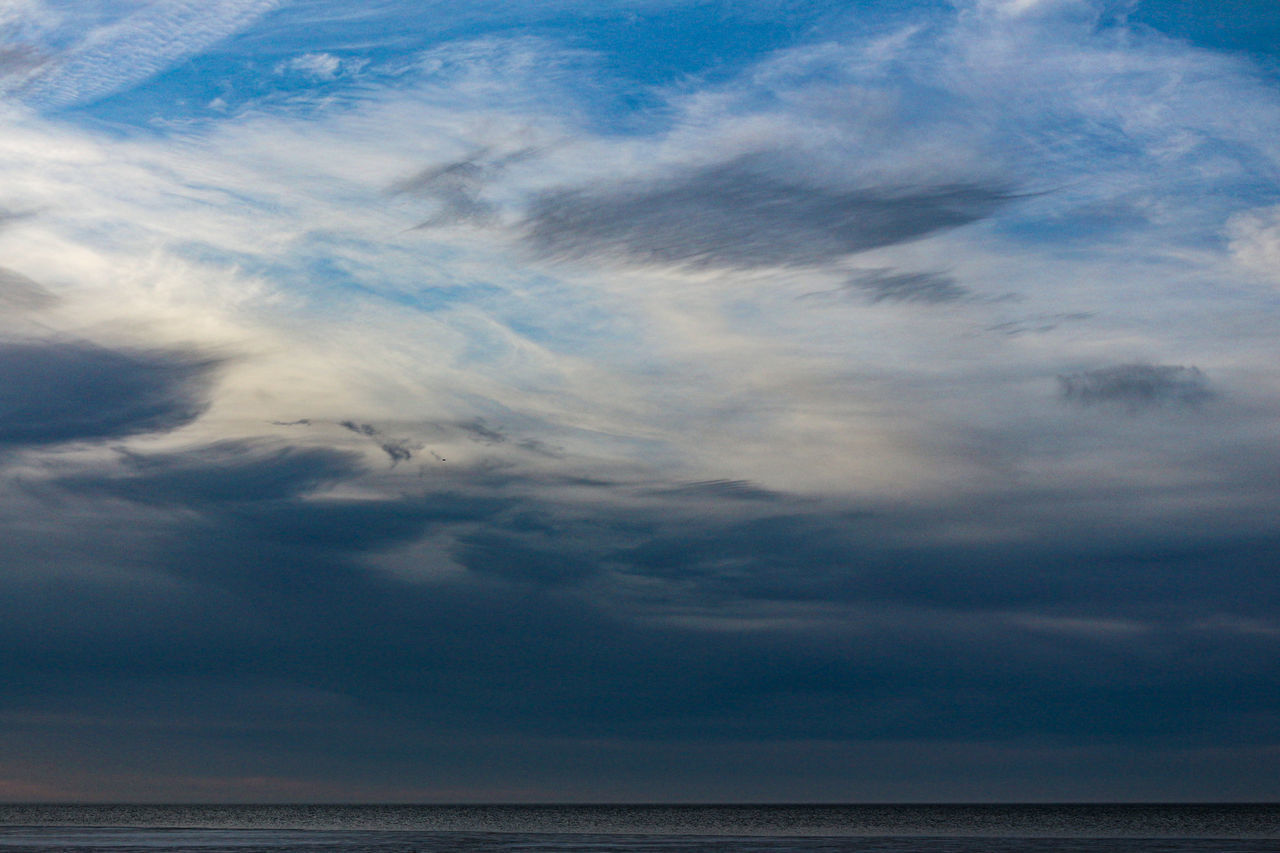 sky, cloud, horizon, water, sea, beauty in nature, ocean, scenics - nature, nature, environment, horizon over water, tranquility, blue, no people, dramatic sky, tranquil scene, dusk, outdoors, land, beach, wind wave, coast, cloudscape, wave, seascape, landscape, sunset, idyllic, reflection, sunlight, shore, evening