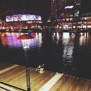 Illuminated street light at night