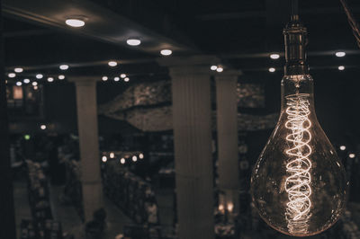 Close-up of illuminated light bulb