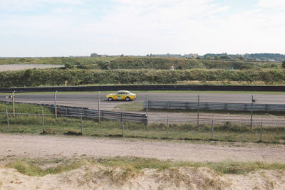 Car moving on race track