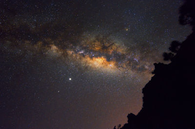 Low angle view of stars in sky at night