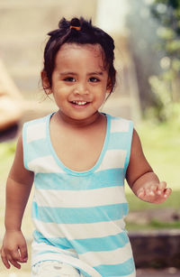 Portrait of cute girl smiling