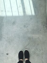 Low section of person standing on floor
