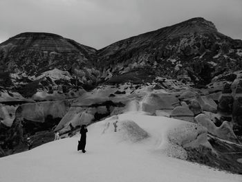 Scenic view of snow mountains against sky