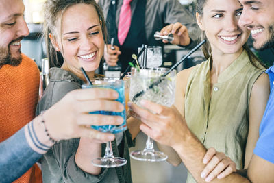 Group of people in a drinking glass