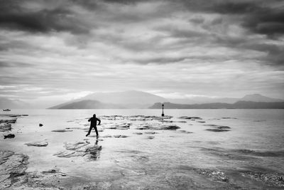 Rear view of man at lake garda