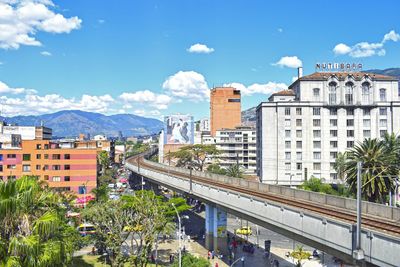 Buildings in city against sky