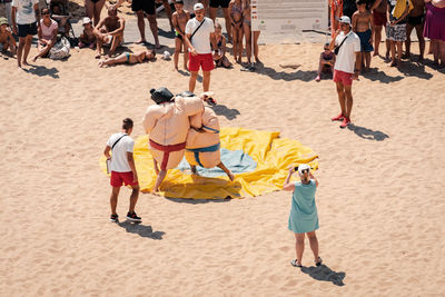 People standing on beach