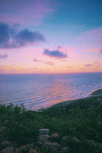 Scenic view of sea against sky during sunset