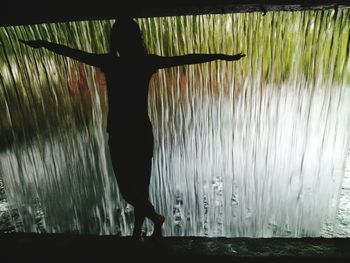 Reflection of woman in water