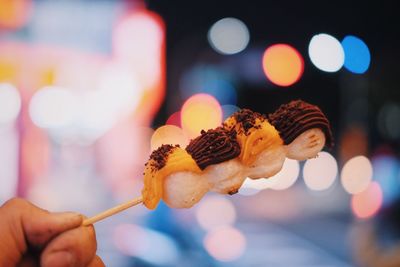 Close-up of person holding ice cream cone