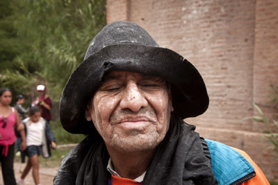 Portrait of man wearing hat