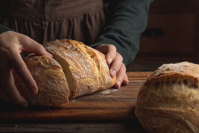 Midsection of man preparing food