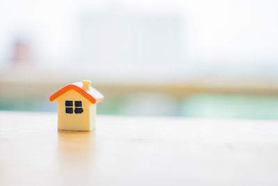 Close-up of model home on table