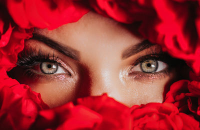 Close-up of young woman wearing hat