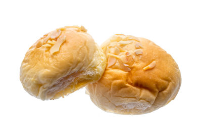High angle view of bread against white background