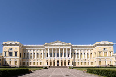 Facade of building against blue sky