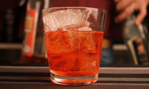 Close-up of ice tea in glass on table