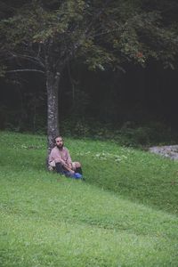 Man sitting on field