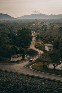 High angle view of road amidst landscape against sky