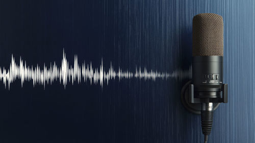 Close-up of microphone against black background