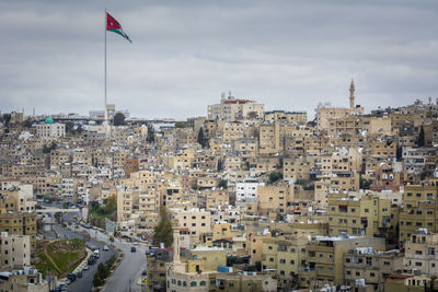 Cityscape and skyline of amman in jordan, with view on the raghadan flagpole