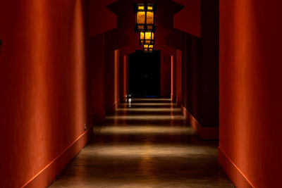 Illuminated corridor of building