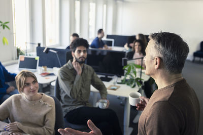 Group of business people having meeting in office