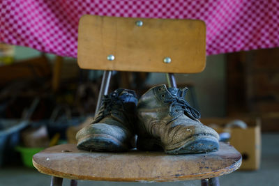 Close-up of old sculpture on table