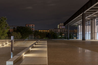 Illuminated buildings against sky