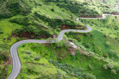 High angle view of road amidst mountain