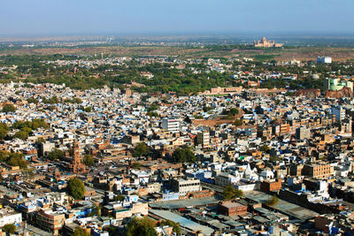 High angle view of buildings on sunny day in city