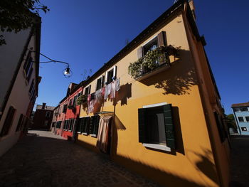 Low angle view of buildings against sky