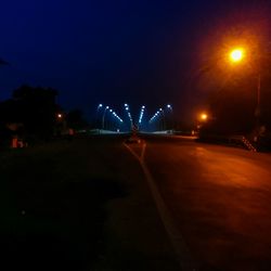 Illuminated road at night