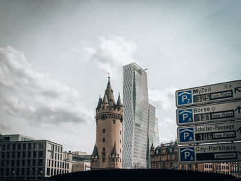 Low angle view of buildings in city against sky