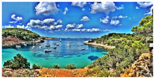 Panoramic view of sea against blue sky