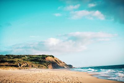 Scenic view of beach against sky