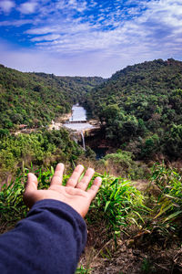 Low section of man against mountain