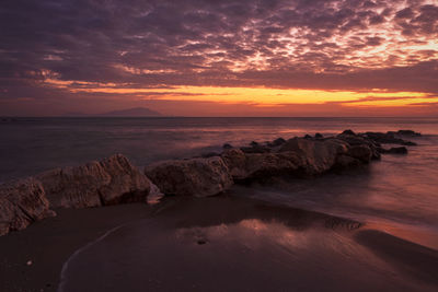 Scenic view of sea against sky during sunset