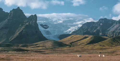 Panoramic view of mountain range against sky