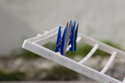 Close-up of clothespin on clothespins
