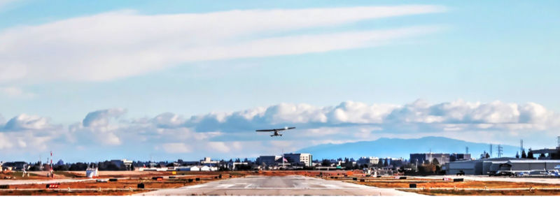 Airplane flying in sky