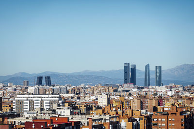 Landscape of the city of madrid spain and in the background the four towers.