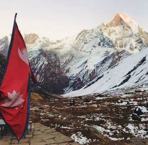 Scenic view of snowcapped mountains against clear sky