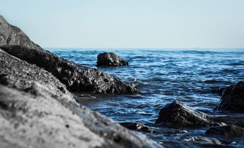 Scenic view of sea against clear sky