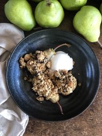 High angle view of fruits in plate on table