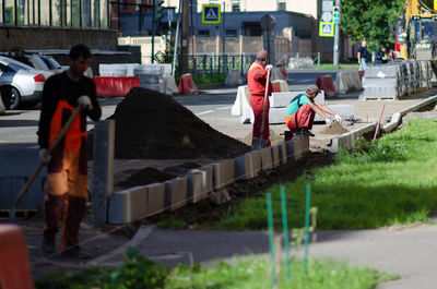 People working in city