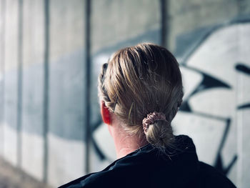 Rear view of woman in a tunnel